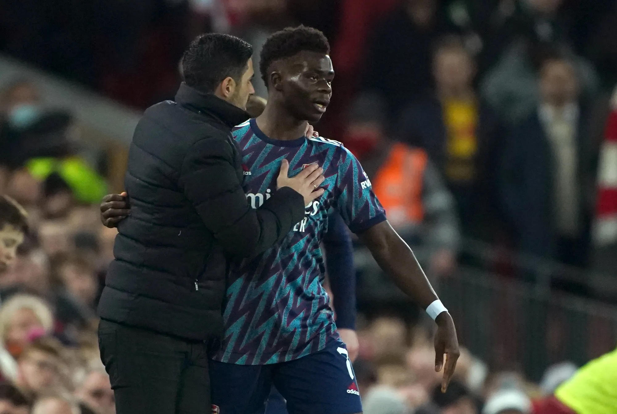 Arsenal manager Mikel Arteta issues instructions to winger Bukayo Saka