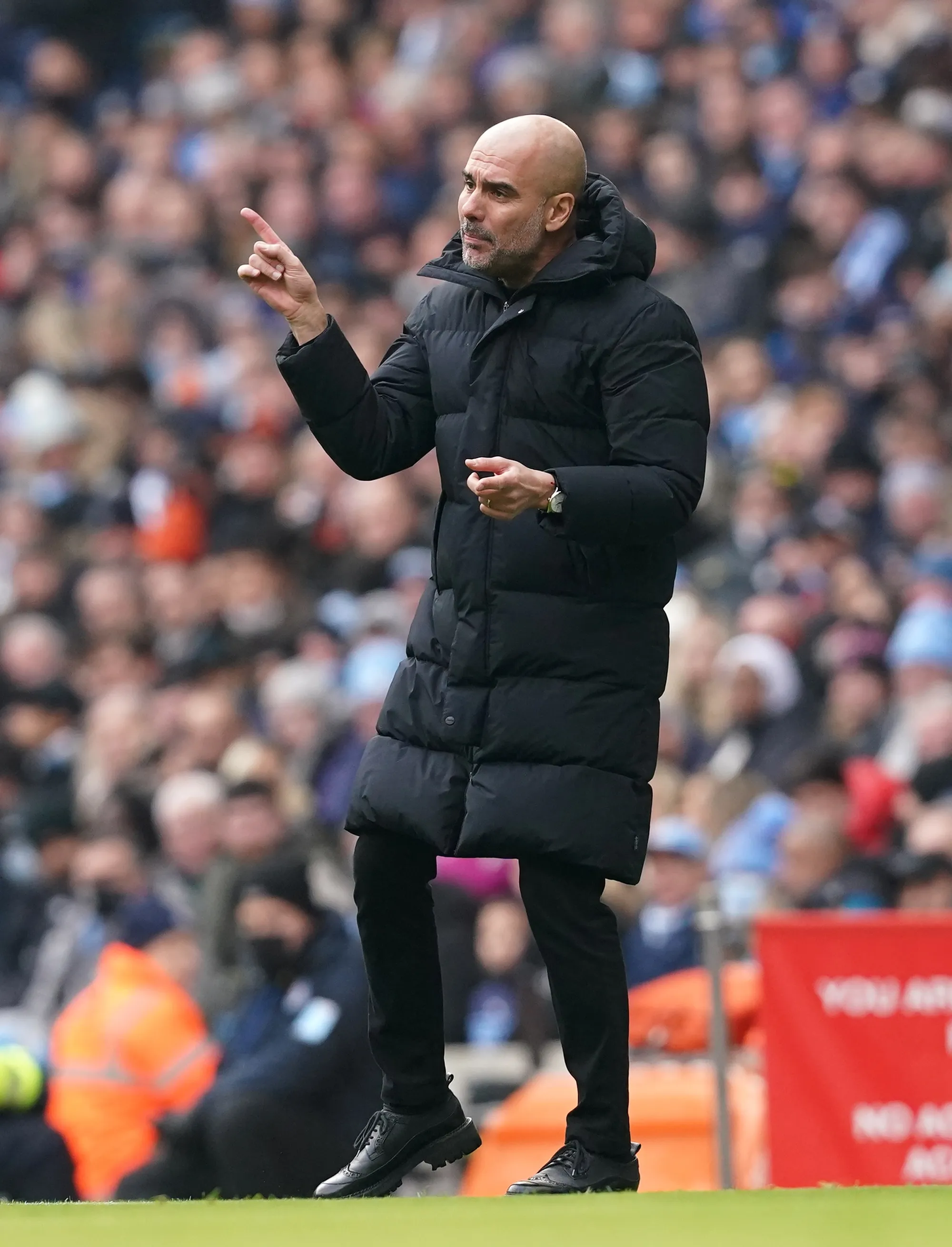 Pep Guardiola issues instructions to his Manchester City team in the 1-0 win over Chelsea