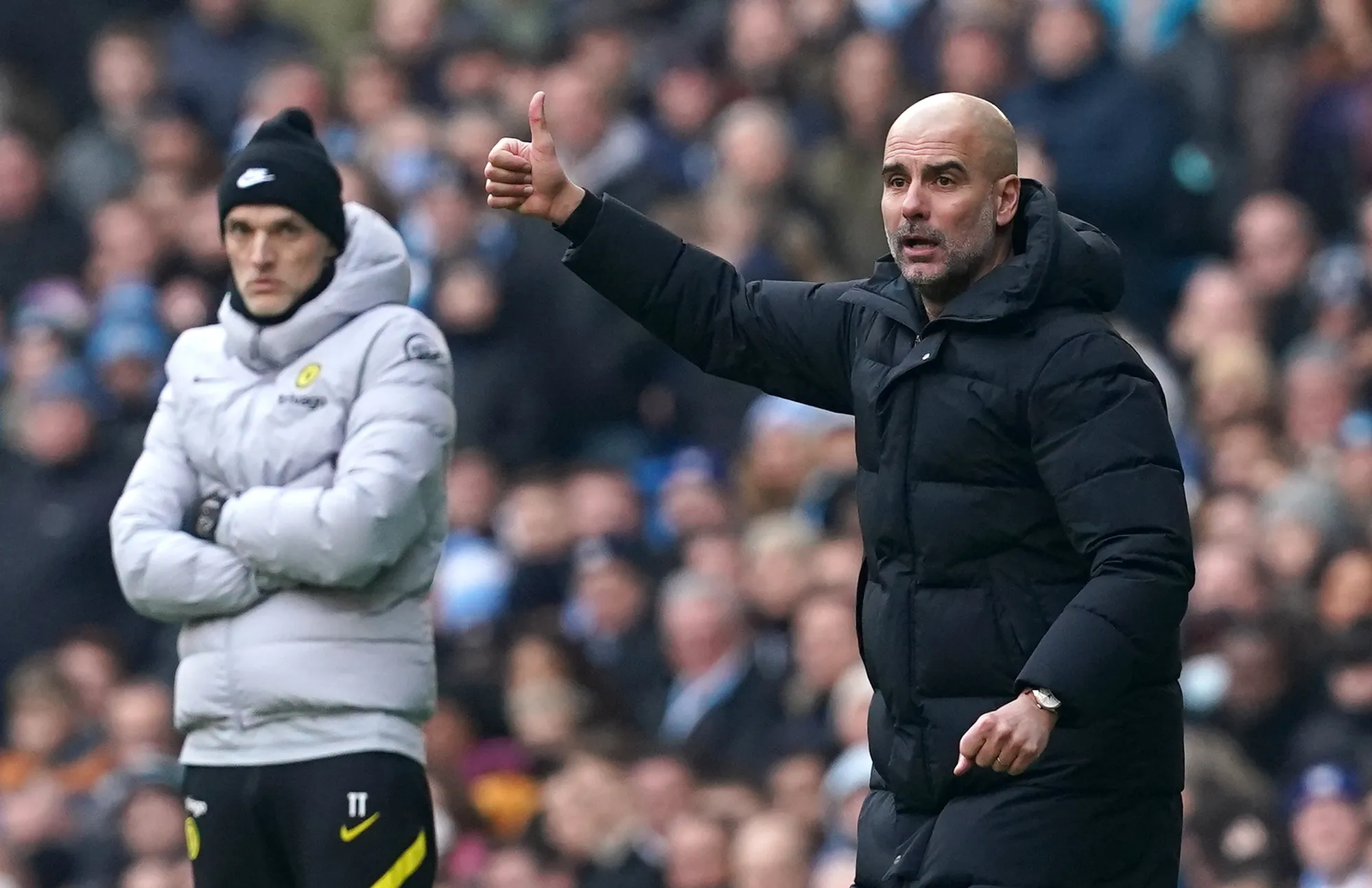 Pep Guardiola and Thomas Tuchel on the touchline with the Man City manager the happier of the two