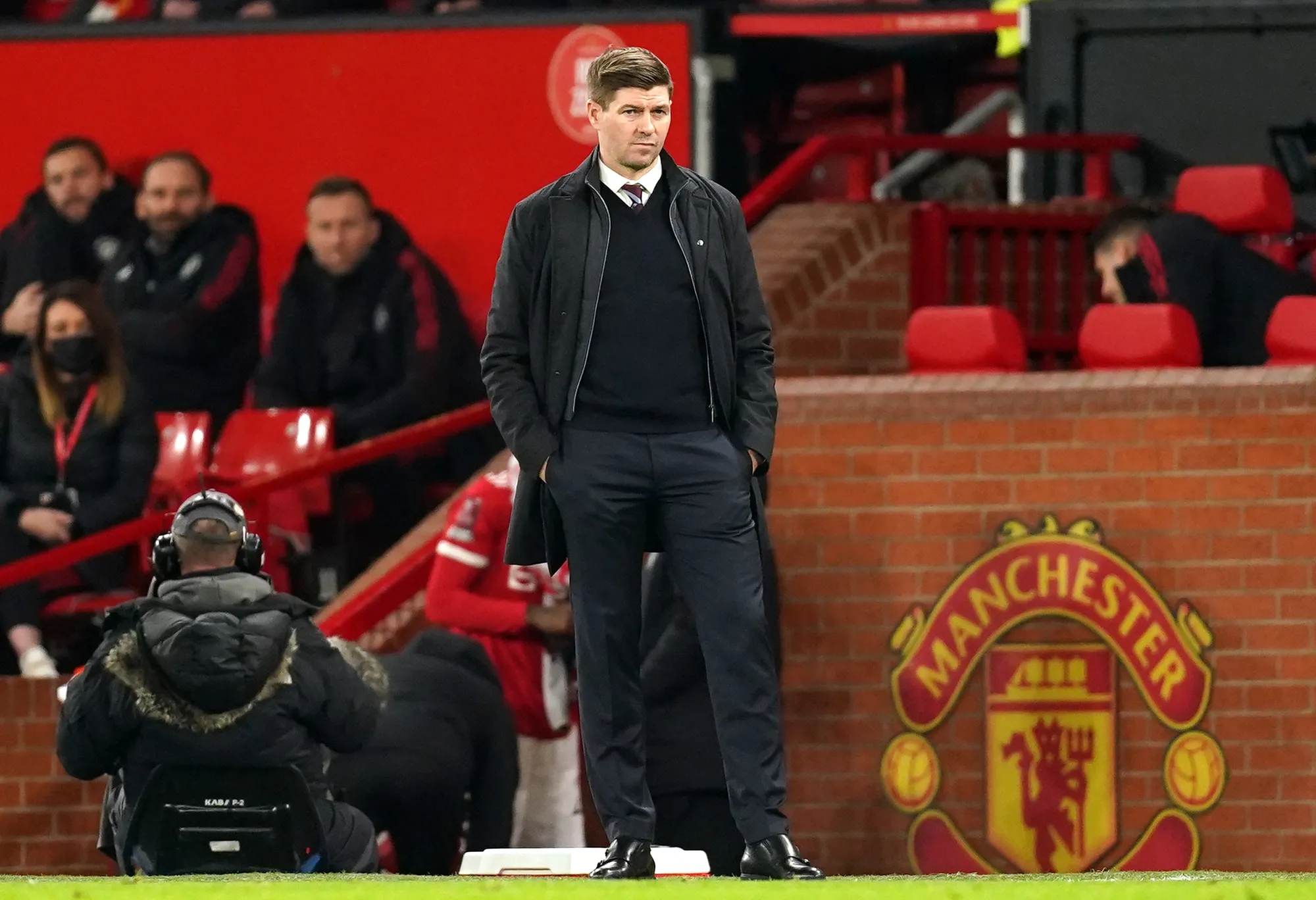 Steven Gerrard cuts a forlorn figure on the touchline