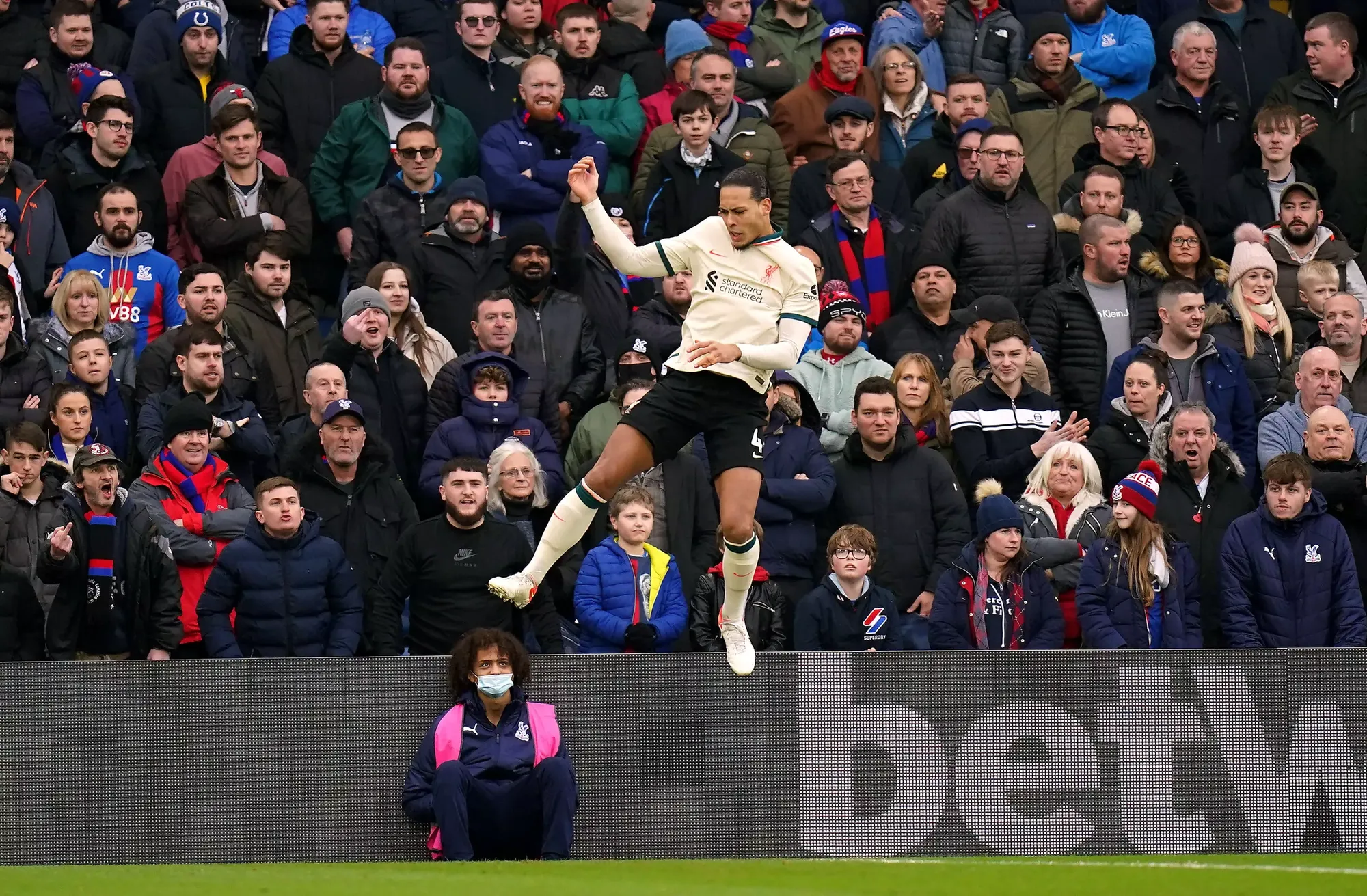 Virgil Van Dijk leaps in the air after scoring Liverpool's opening goal against Crystal Palace