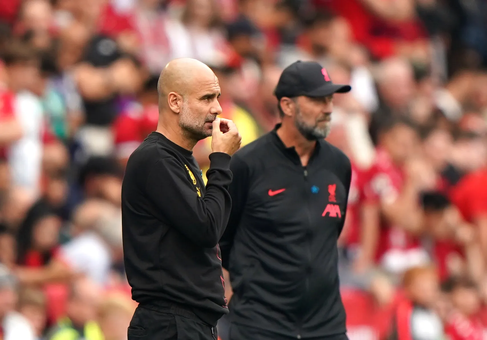 Managers Pep Guardiola and Jurgen Klopp on the touchline at the King Power Stadium