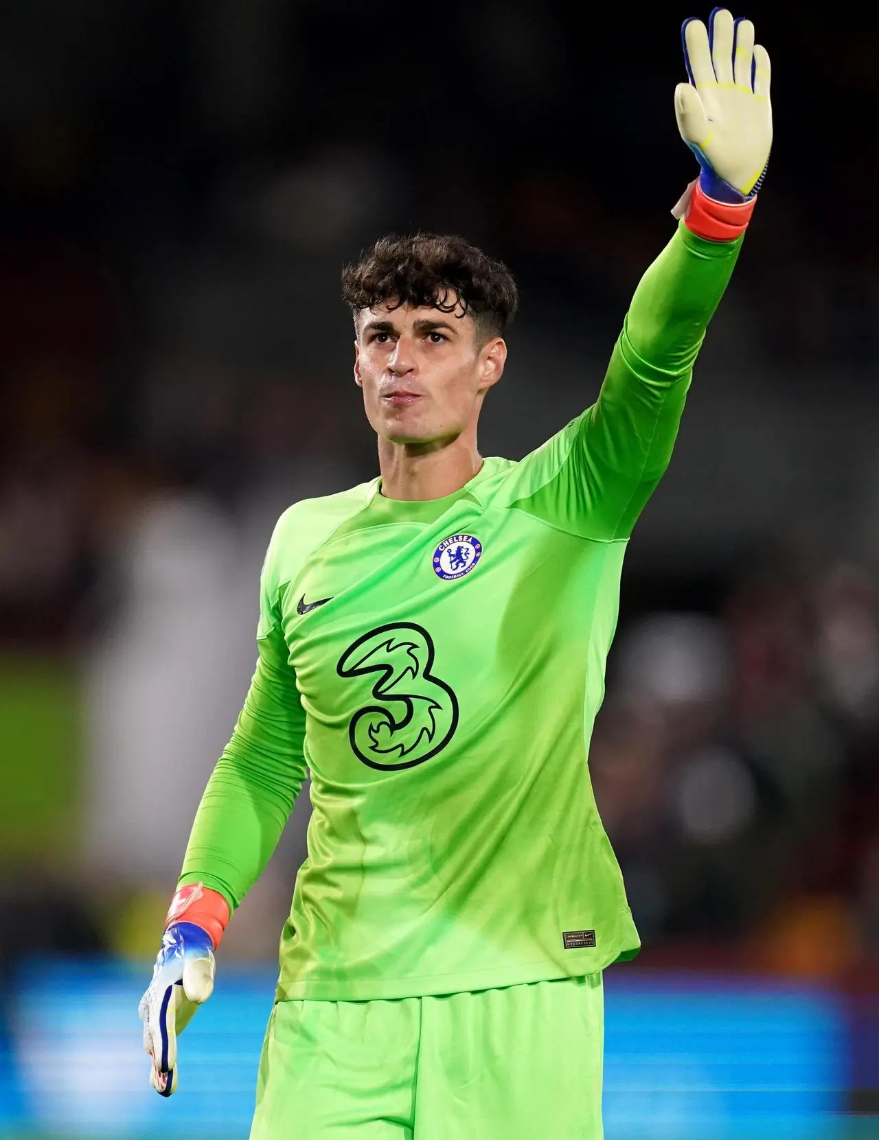 Chelsea goalkeeper Kepa Arrizabalaga salutes the fans