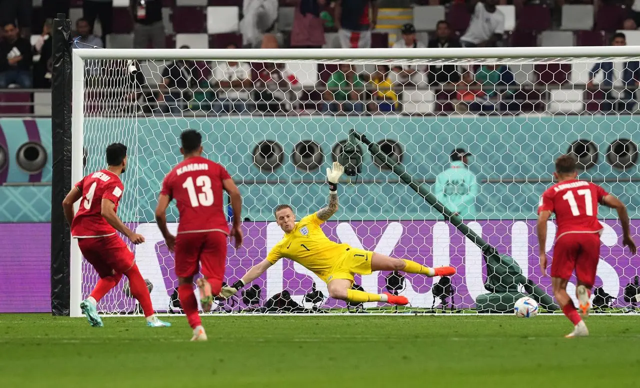 Mehdi Taremi scores a late penalty for Iran 