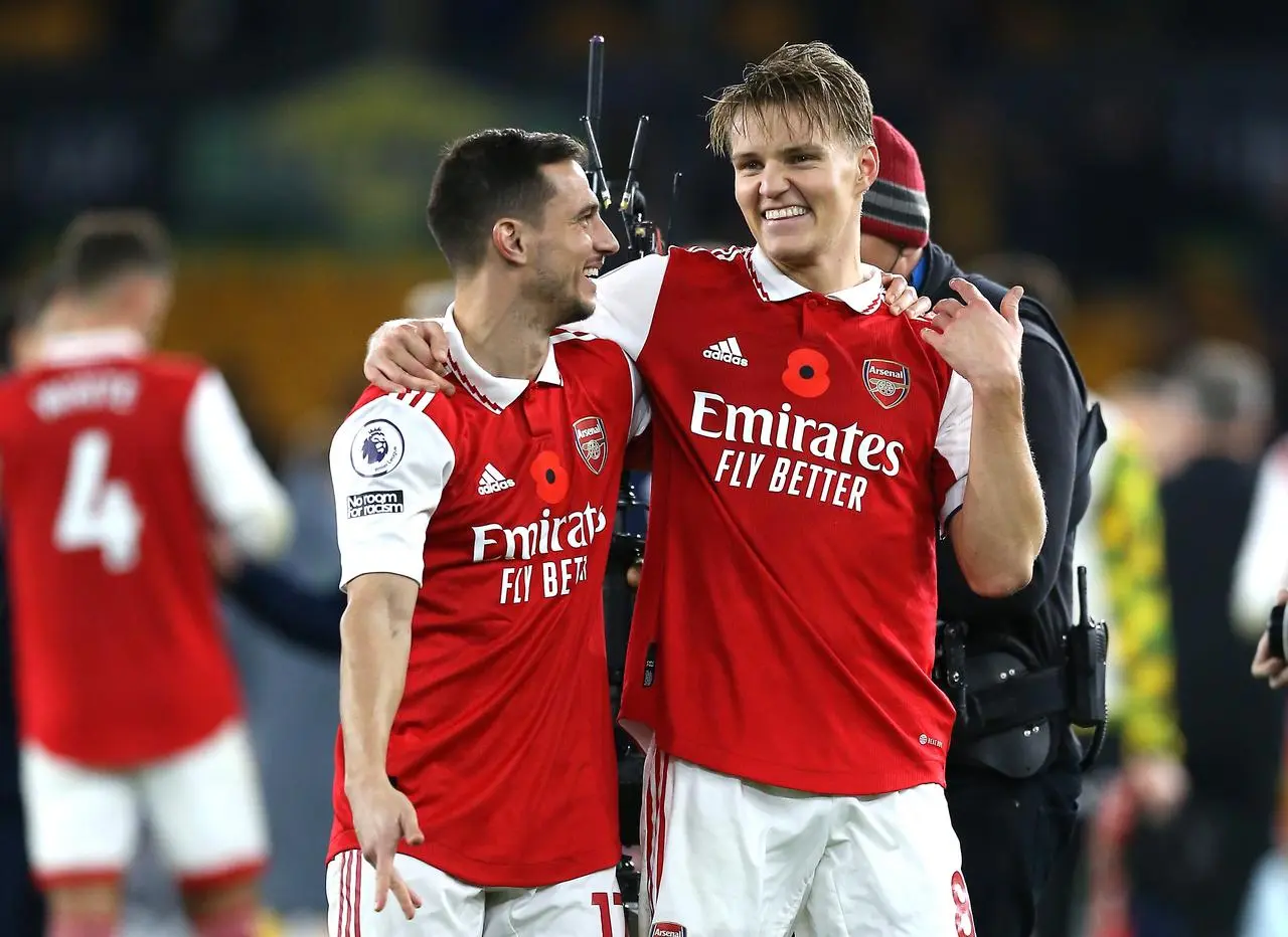 Cedric Soares (left) and Martin Odegaard celebrate