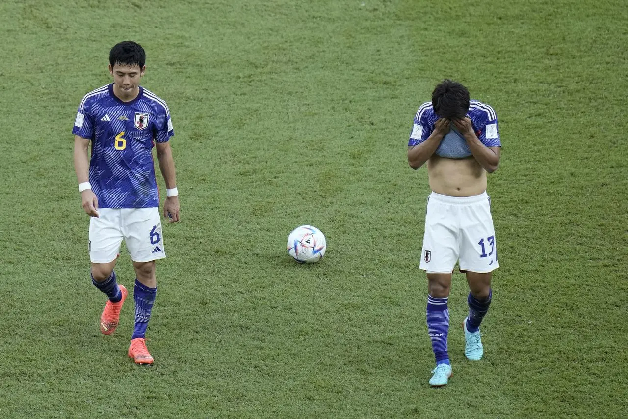 Japan players dejected