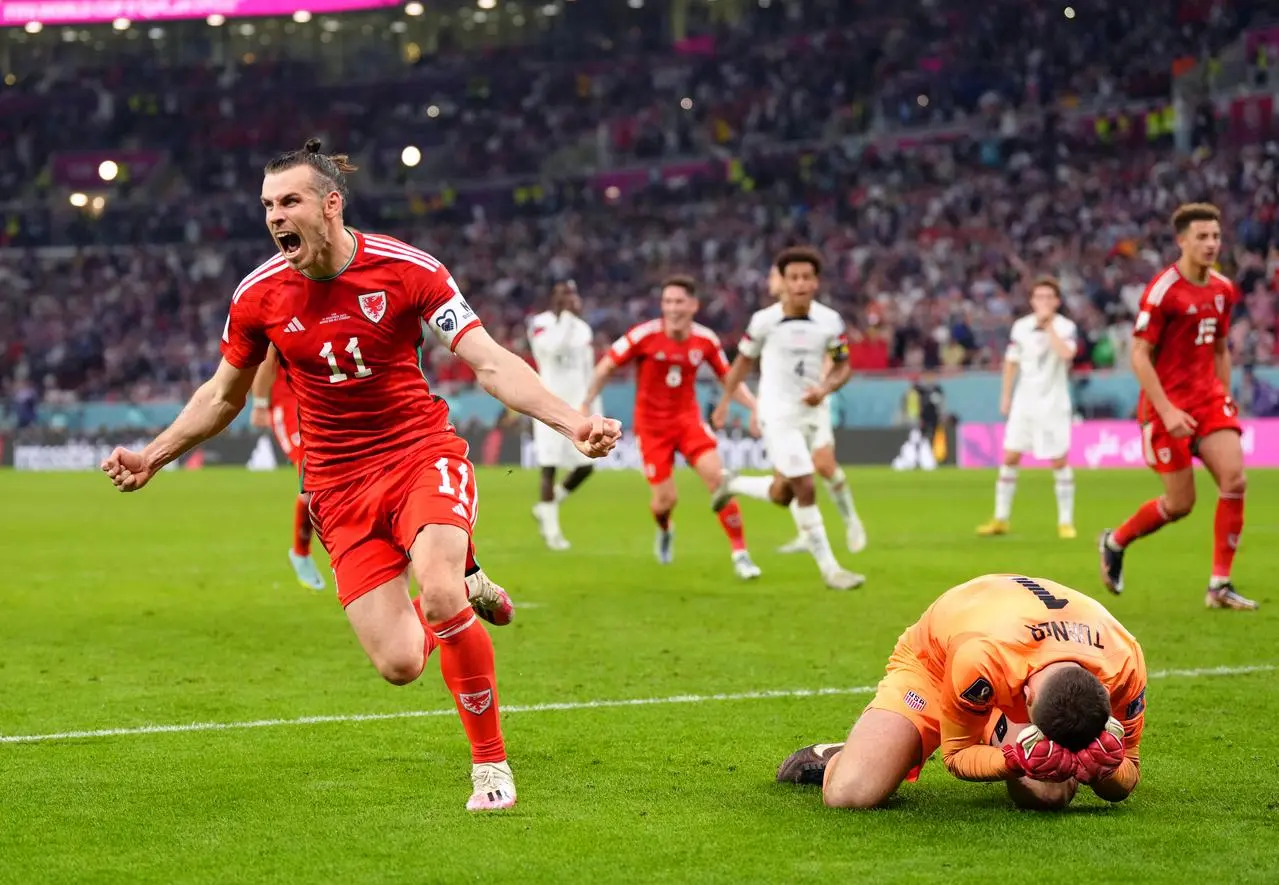 Gareth Bale celebrates after scoring from the spot against the United States (Nick Potts/PA).