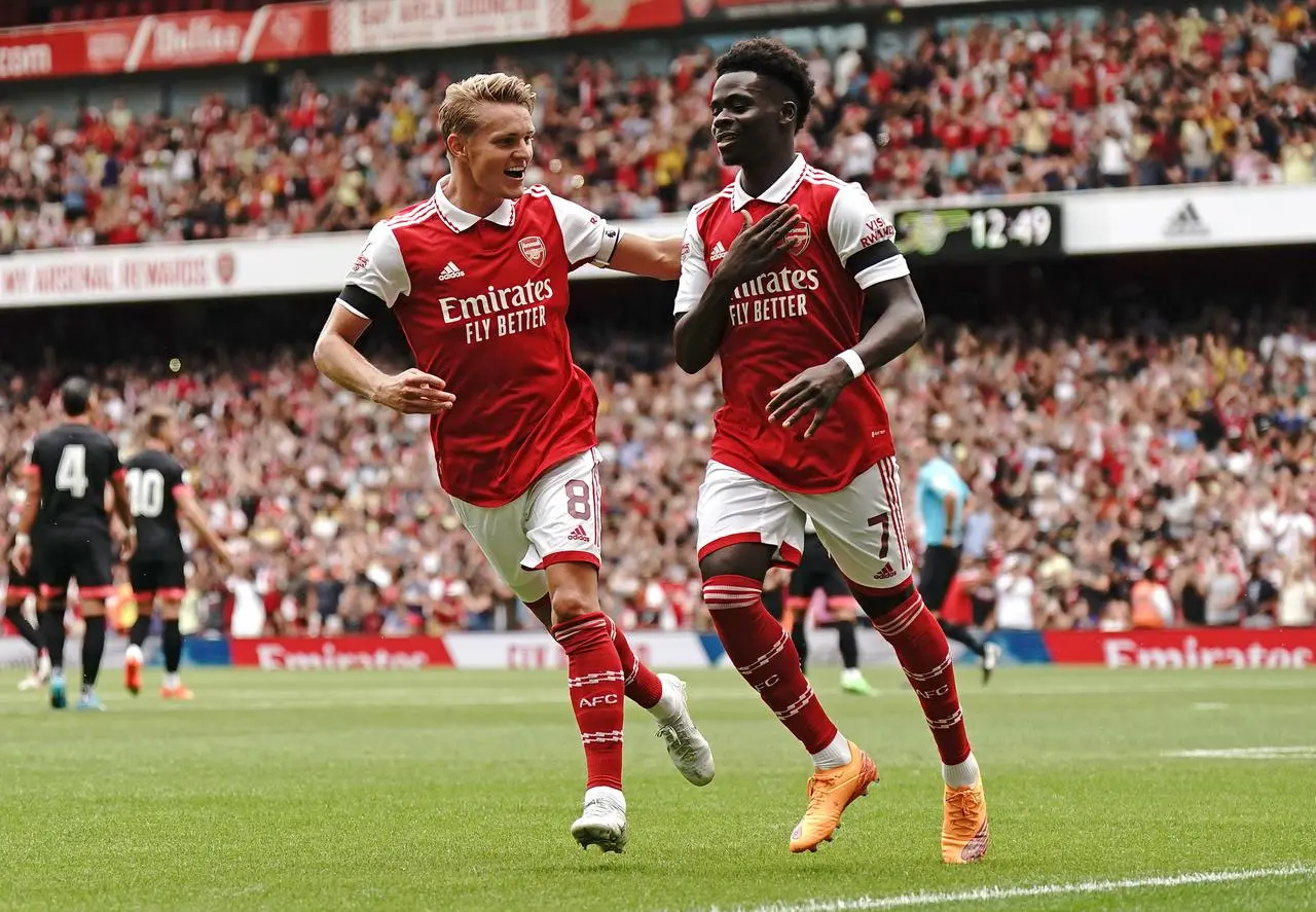 Martin Odegaard (left) and Bukayo Saka (right) have been instrumental in Arsenal's fine season.