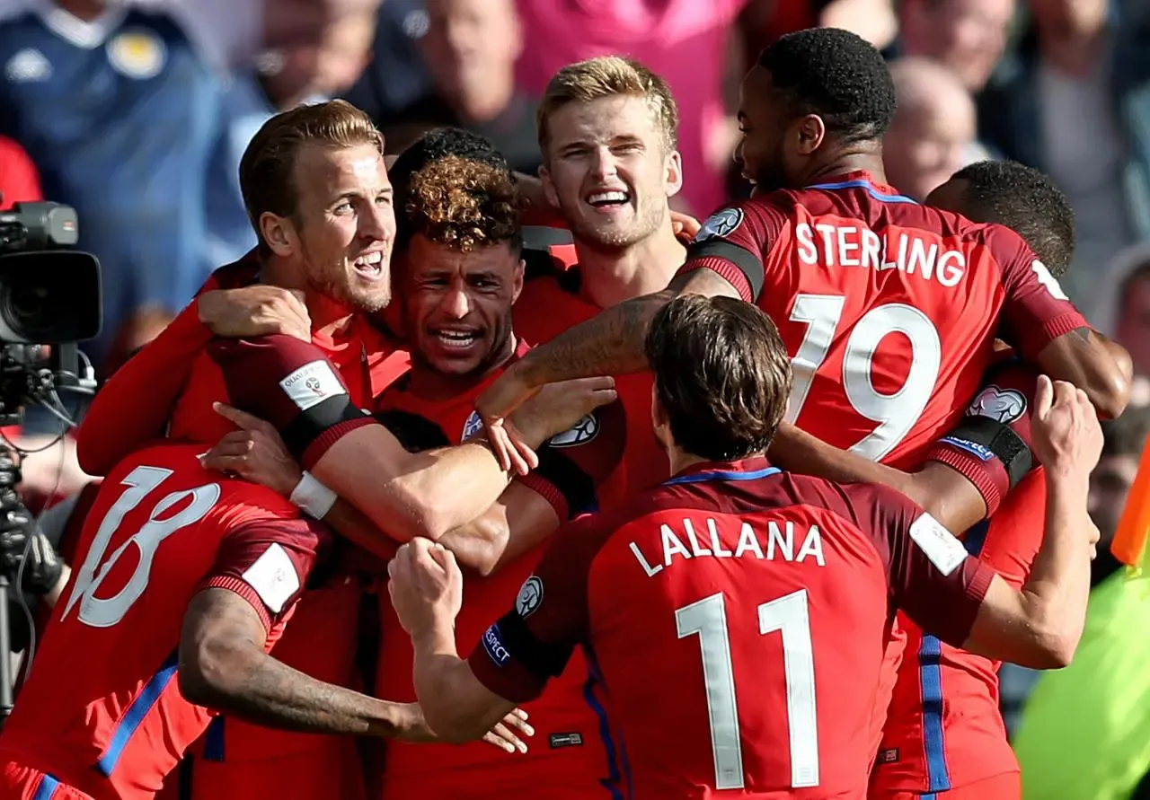 Kane (second left) broke the hearts of Scotland fans with his late equaliser at Hampden Park.