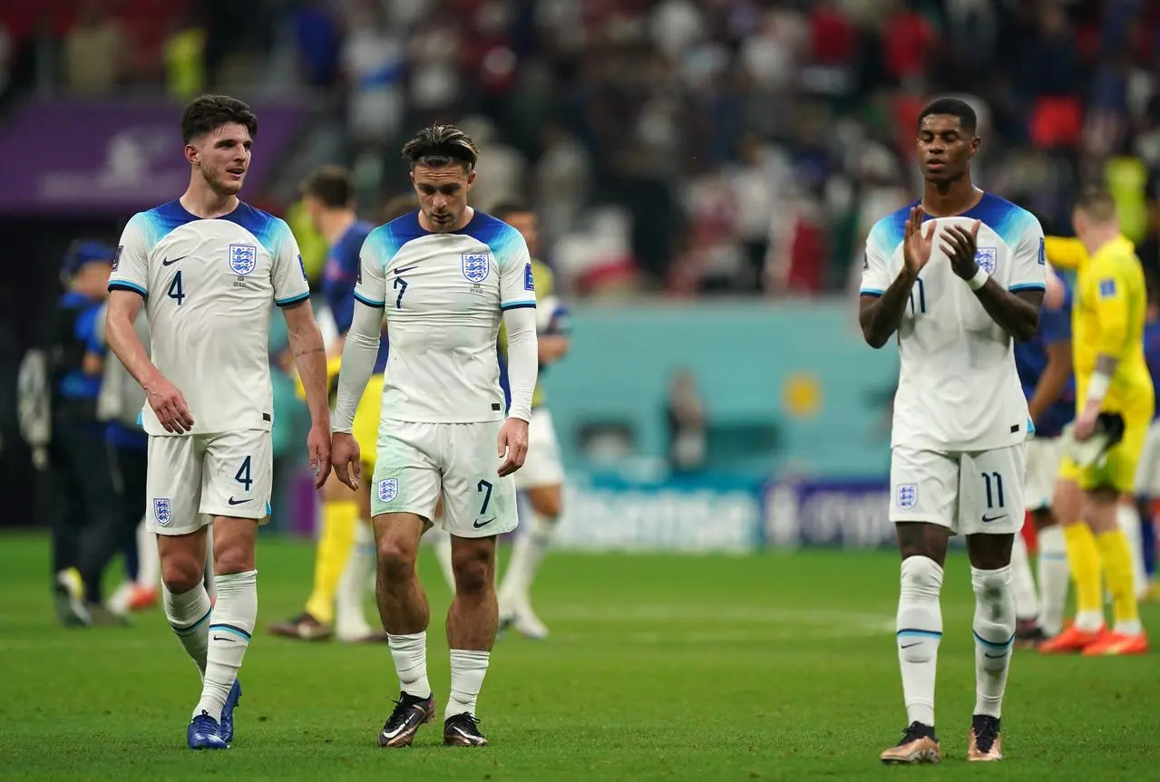 England’s Declan Rice, Jack Grealish and Marcus Rashford appear dejected 