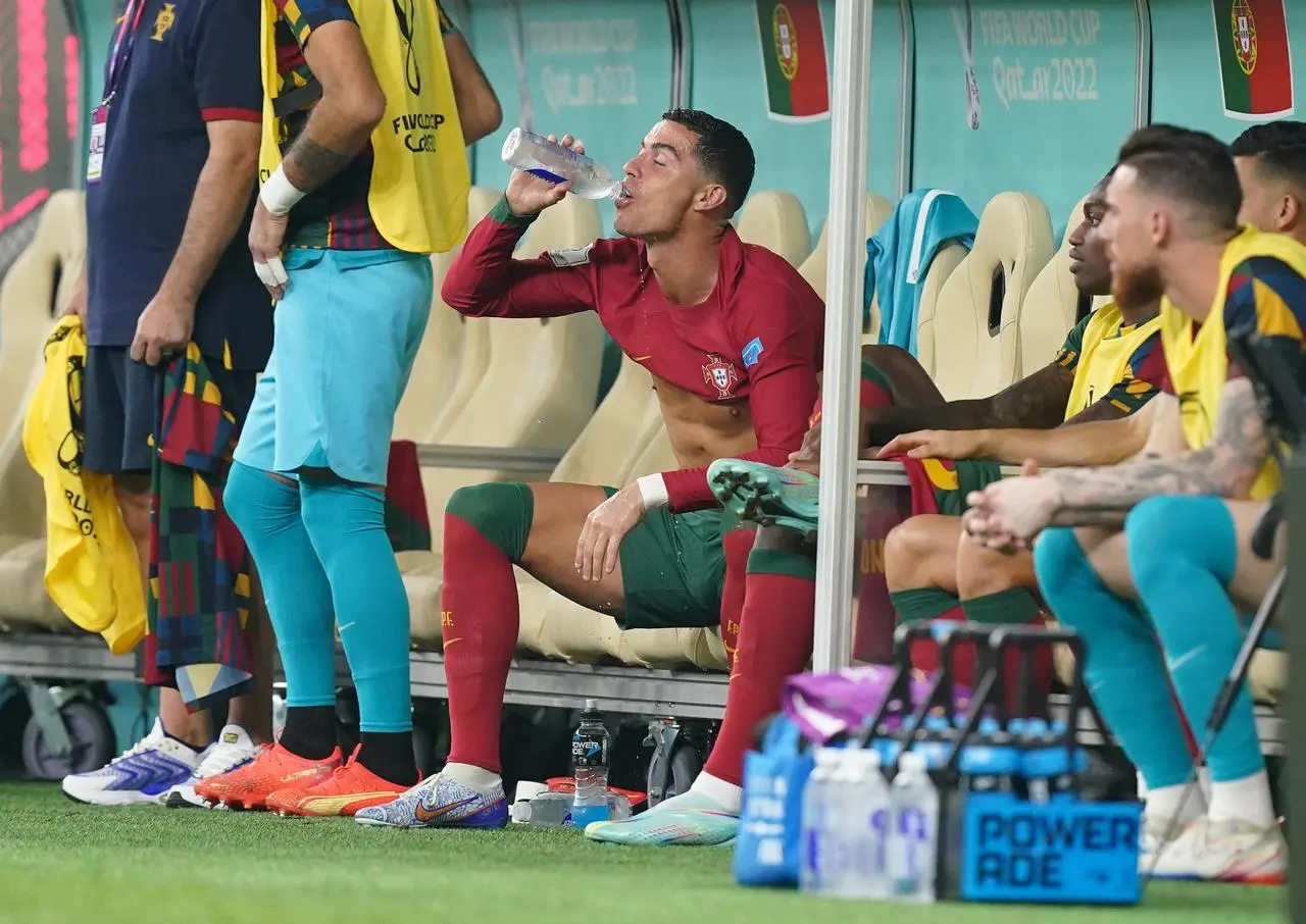 Cristiano Ronaldo prepares to come on against Switzerland