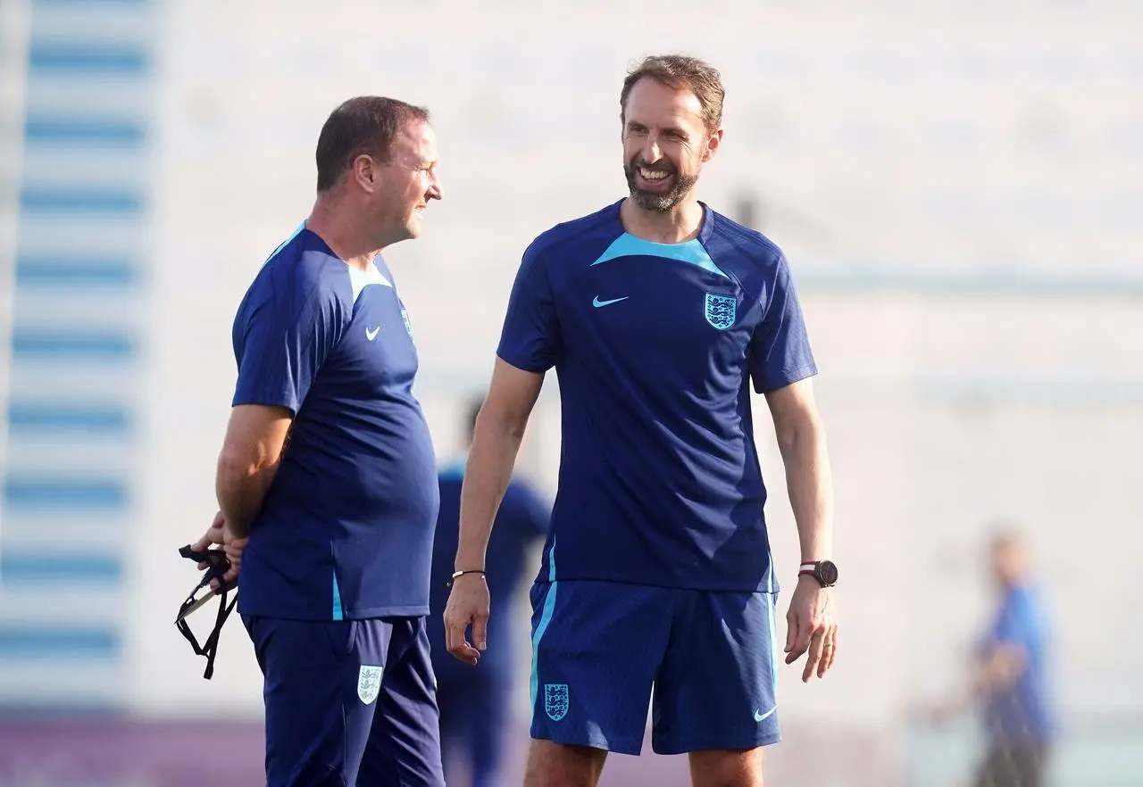 England manager Gareth Southgate, right, and assistant Steve Holland