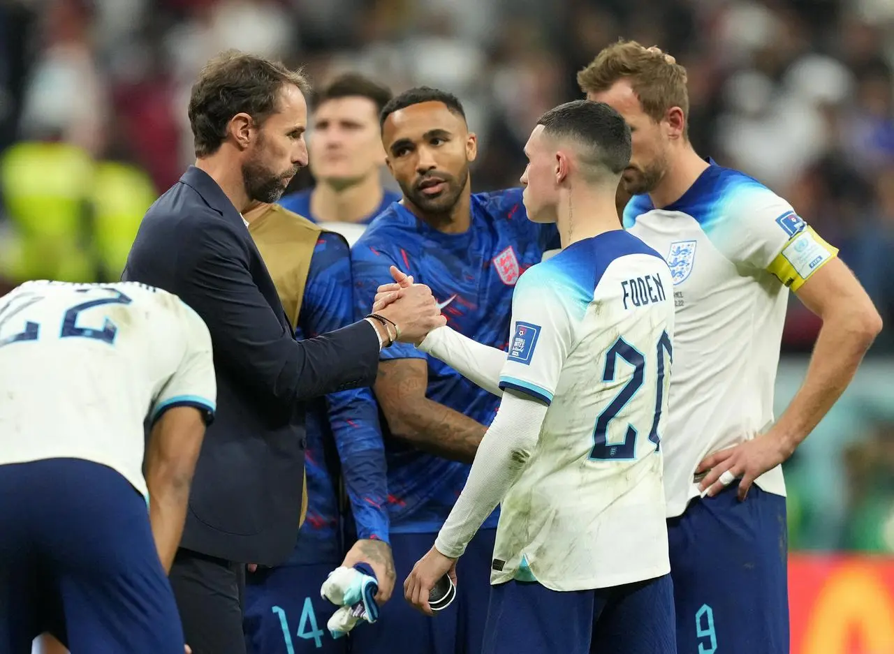 Phil Foden is consoled by England manager Gareth Southgate