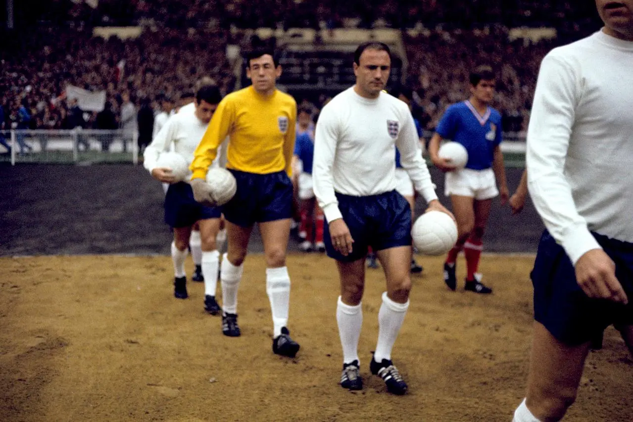 England’s George Cohen, Gordon Banks and Ian Callaghan walk out at Wembley