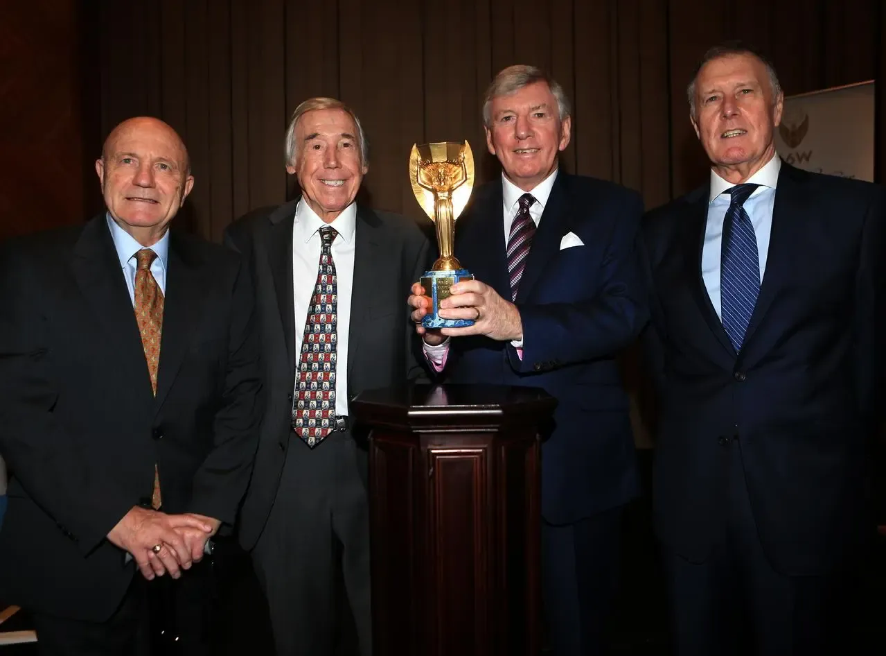 Former England and World Cup winning players (left to right) George Cohen, Gordon Banks, Martin Peters and Sir Geoff Hurst with the Jules Rimet trophy
