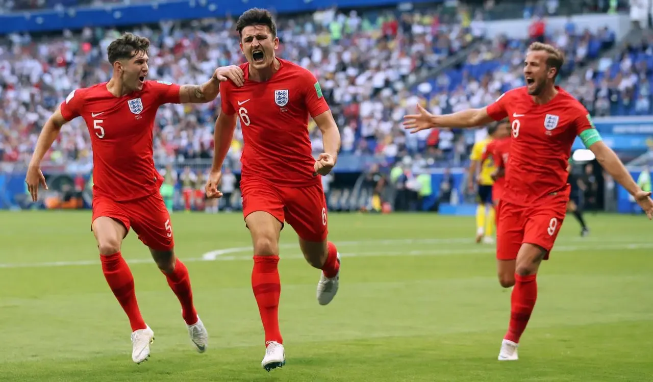 Harry Maguire celebrates scoring in the 2018 quarter-final