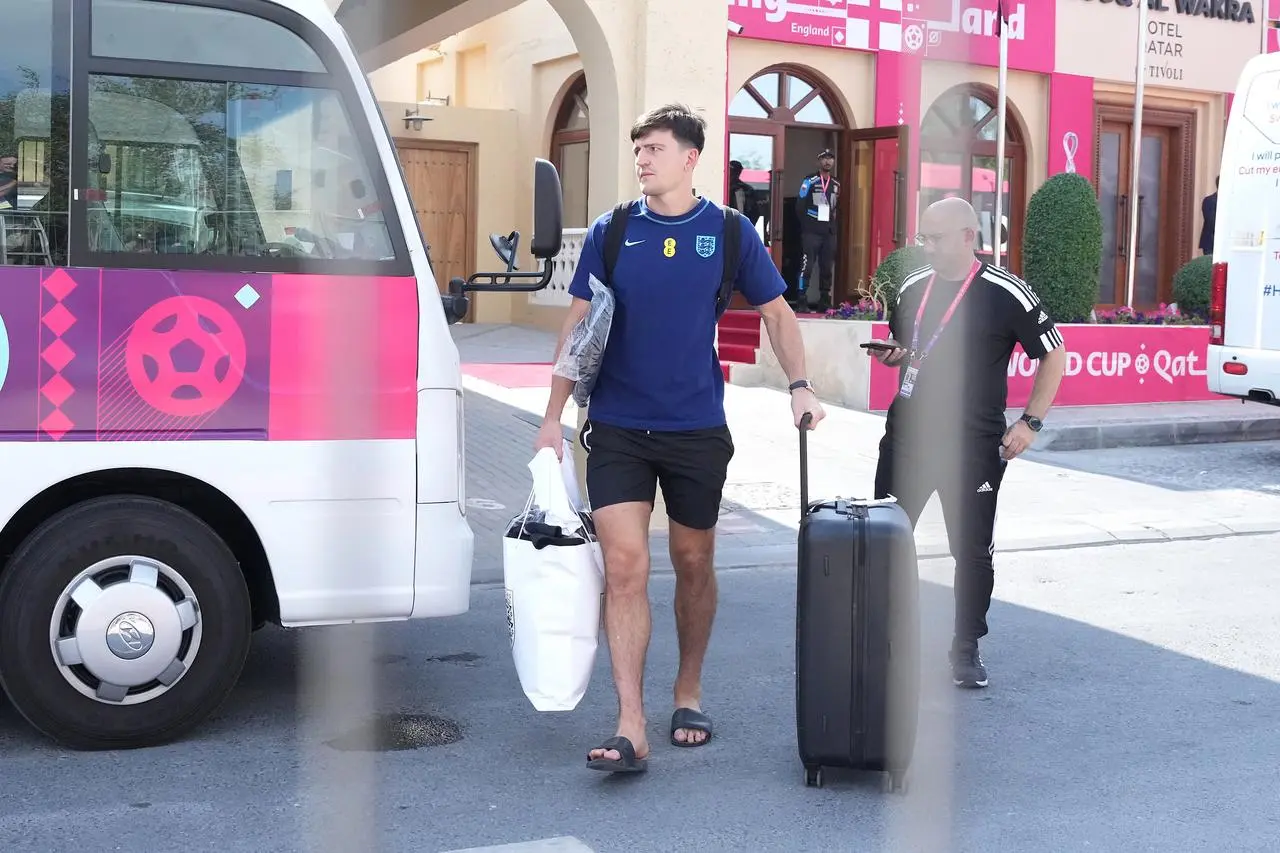 England’s Harry Maguire makes his way to a coach outside the Souq Al-Wakra hotel 