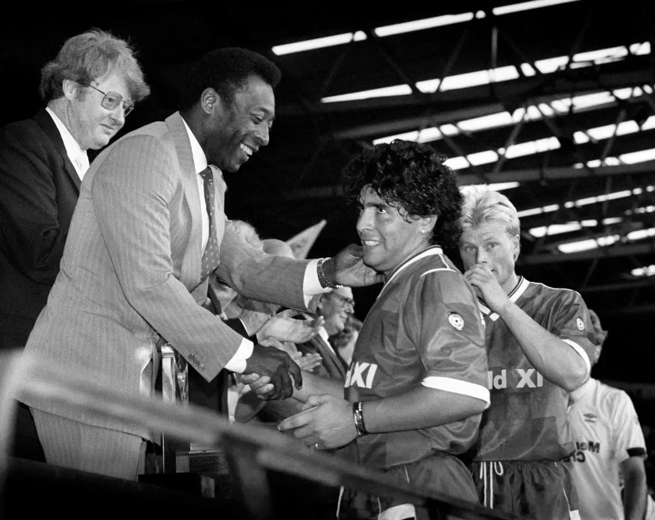 Pele, left, greets Argentina great Diego Maradona at Wembley in August 1987. The Brazilian was a guest of honour for a Football League Centenary Match between a Football League XI and a Rest of the World team