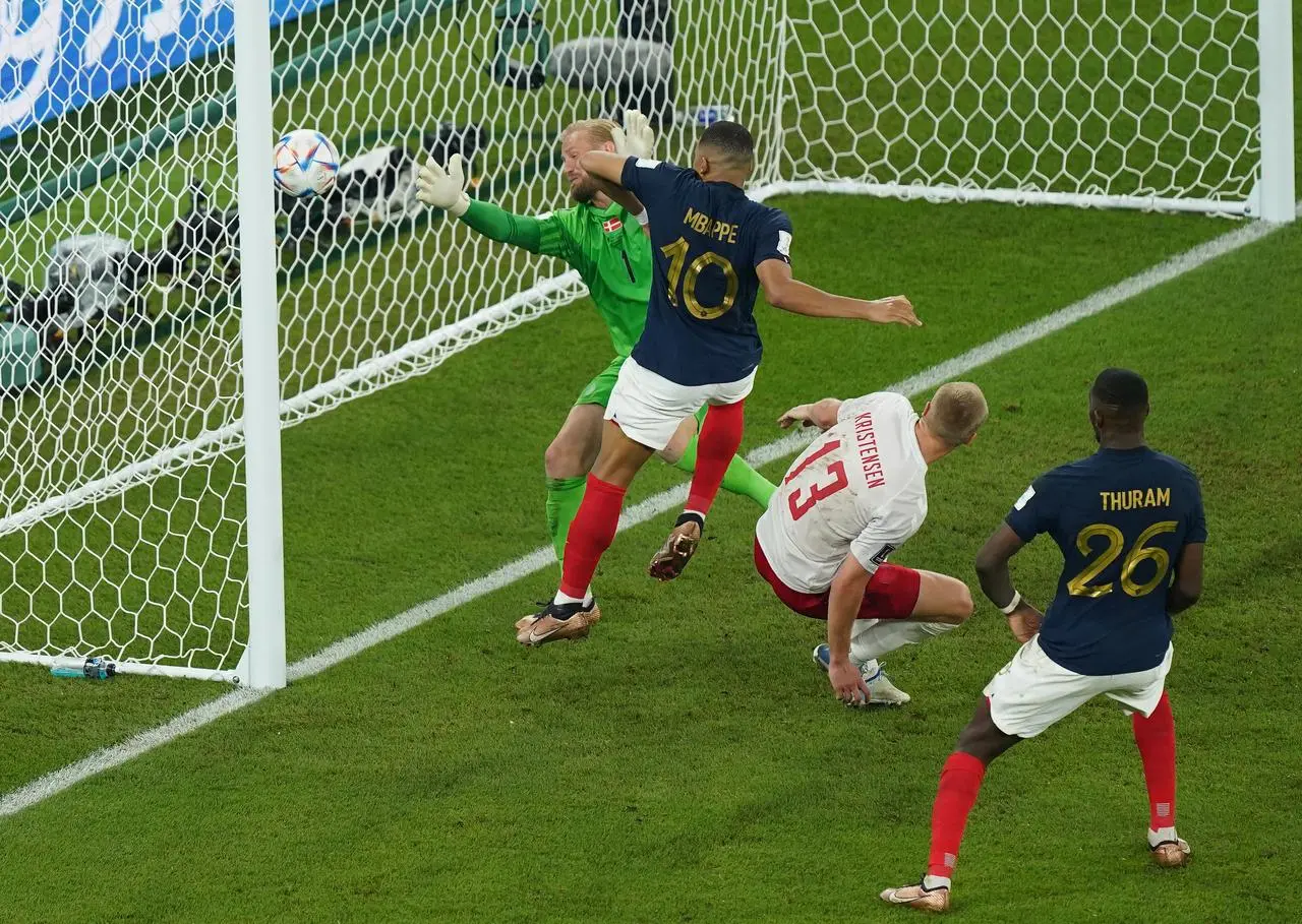 Mbappe nets his second goal in France's victory over Denmark (Mike Egerton/PA).