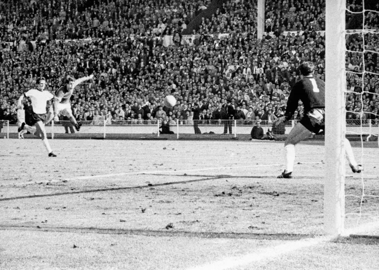 Sir Geoff Hurst scores his third goal in the 1966 World Cup final (PA).