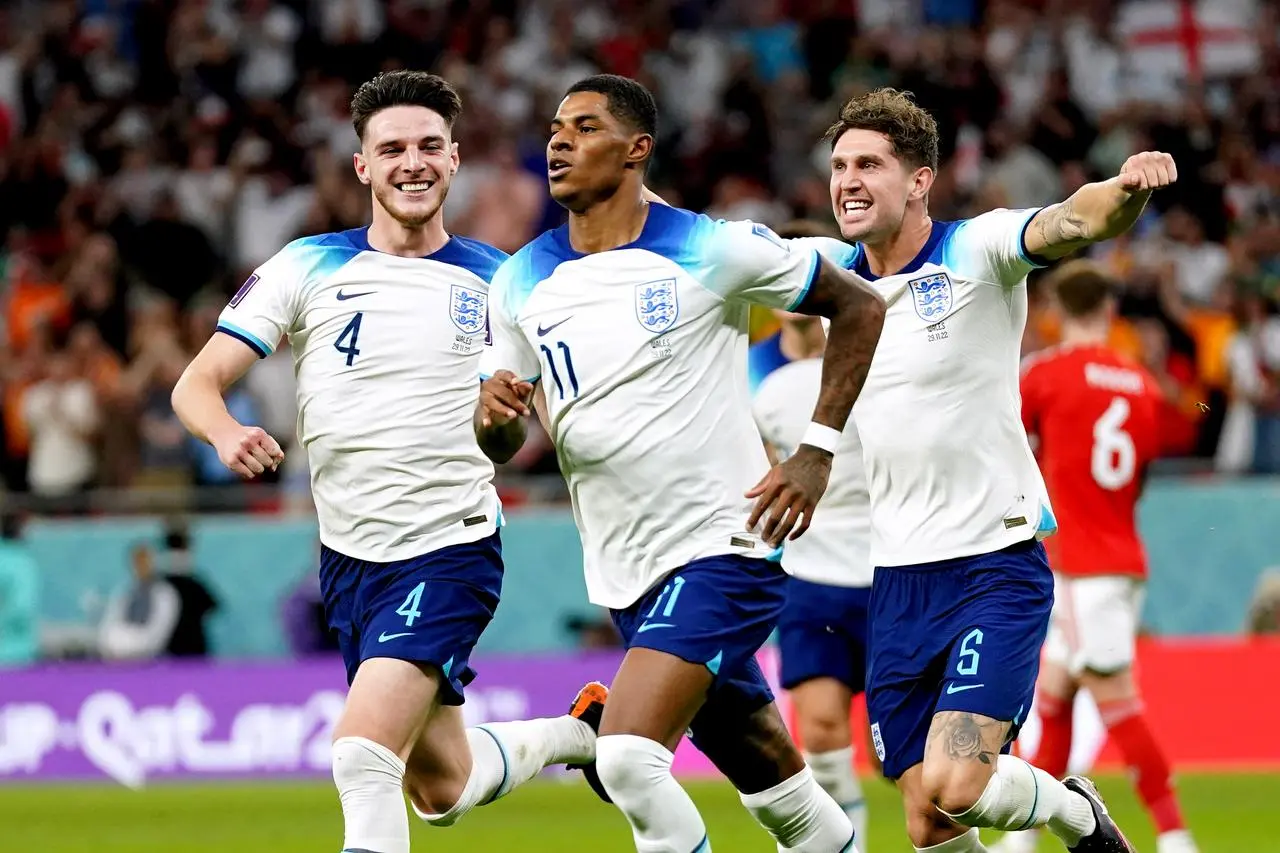 Marcus Rashford celebrates scoring for England at the World Cup in Qatar (Adam Davy/PA).