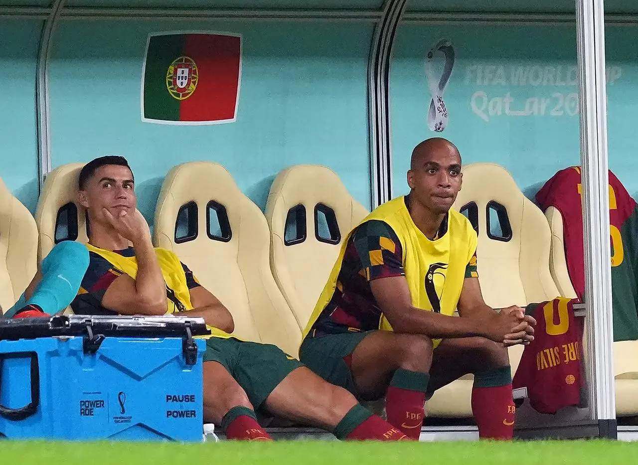 Cristiano Ronaldo (left) started on the bench against Switzerland 