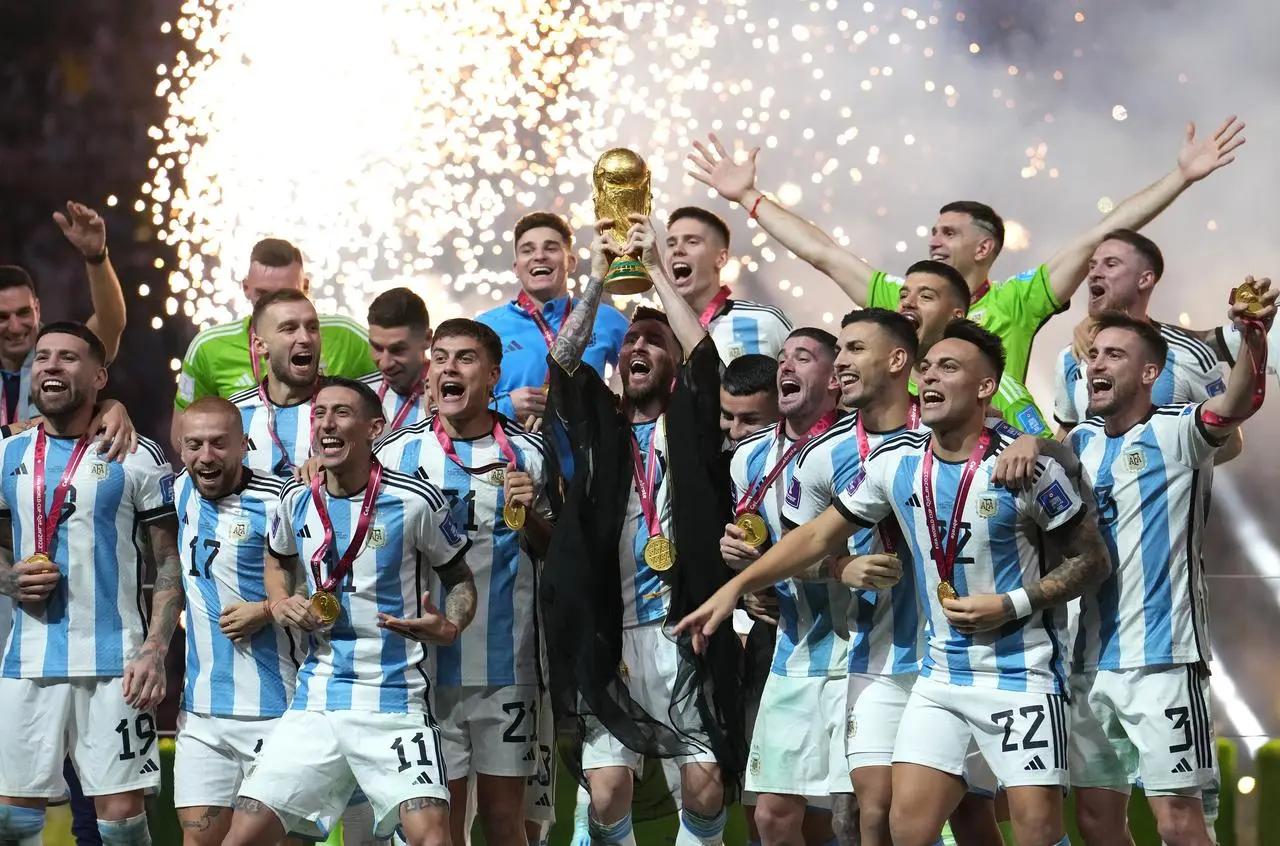 Argentina captain Lionel Messi lifts the World Cup