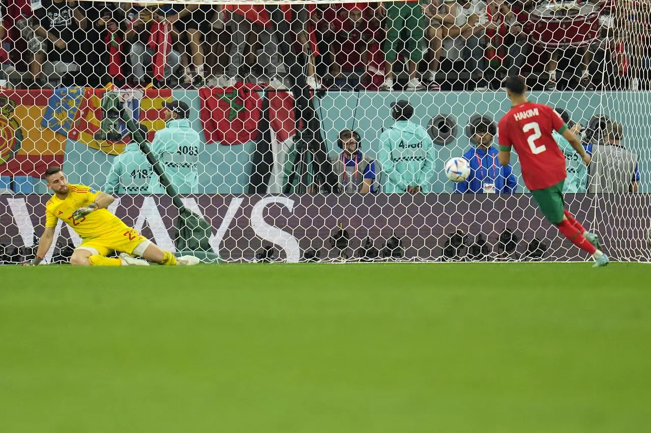 Morocco’s Achraf Hakimi scores past Spain’s goalkeeper Unai Simon