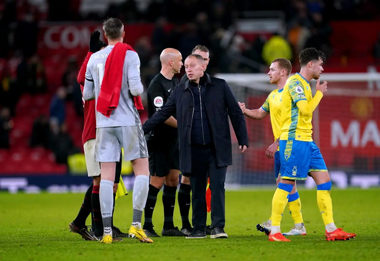 Nottingham Forest manager Steve Cooper, centre, at the end of the match