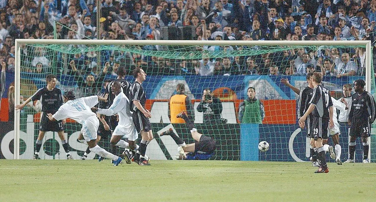 Didier Drogba wheels away after scoring the second of his two goals in Marseille's UEFA Cup semi-final victory over Newcastle