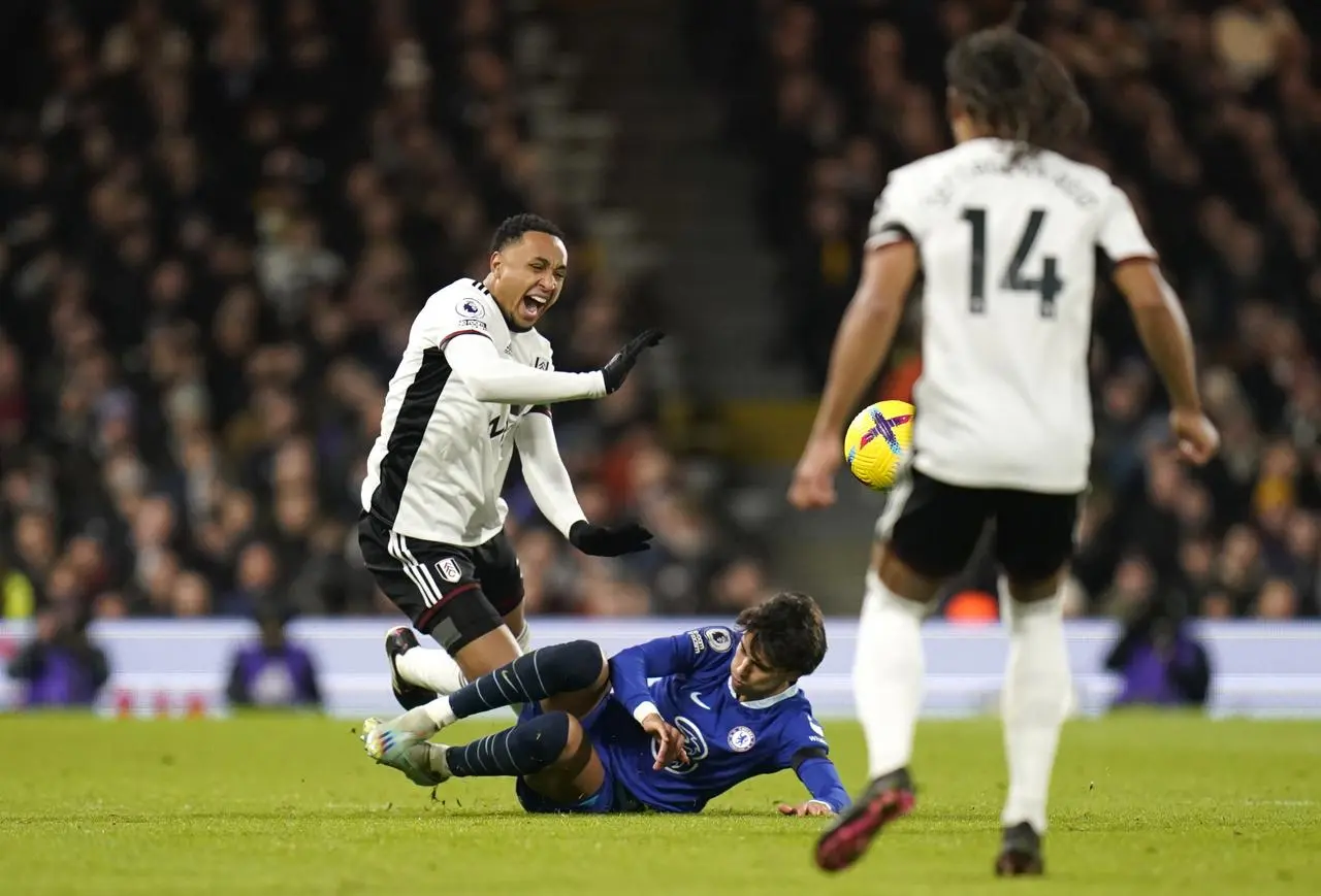 Chelsea’s Joao Felix fouls Fulham’s Kenny Tete