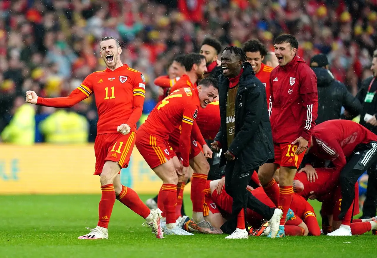 Gareth Bale celebrates leading Wales to their first World Cup in 1958 following victory over Ukraine 