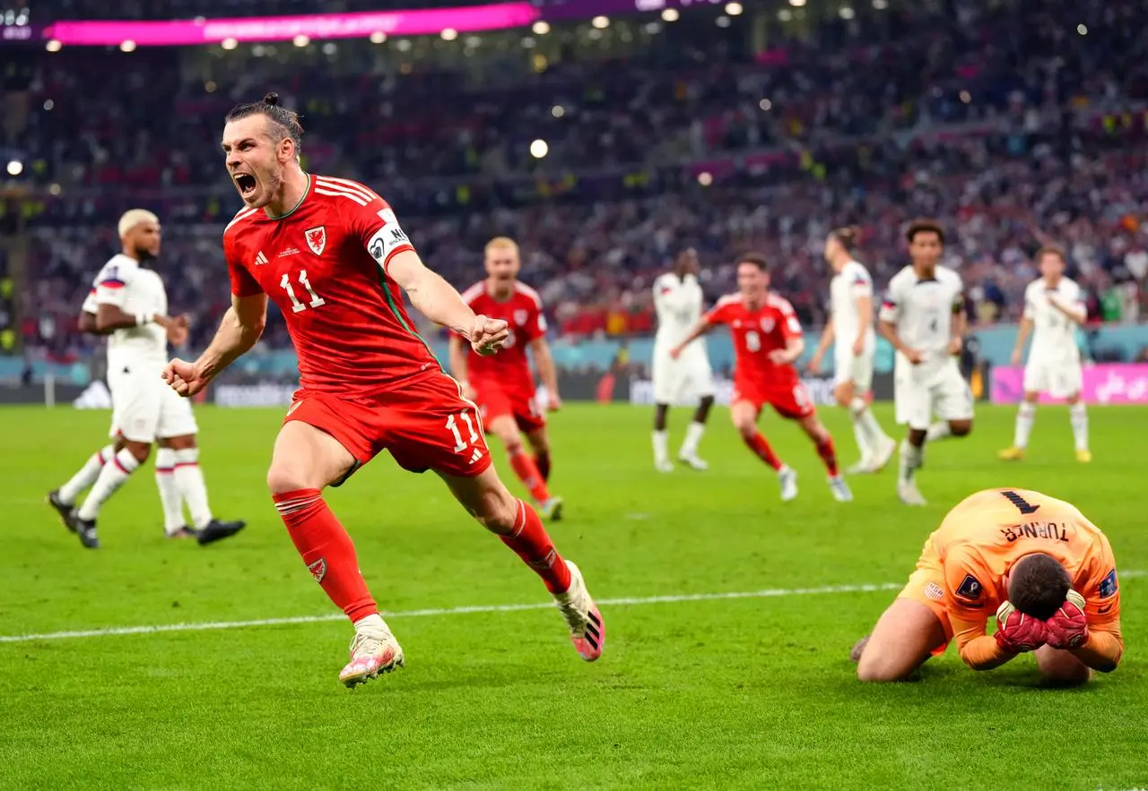 Gareth Bale celebrates scoring against the United States