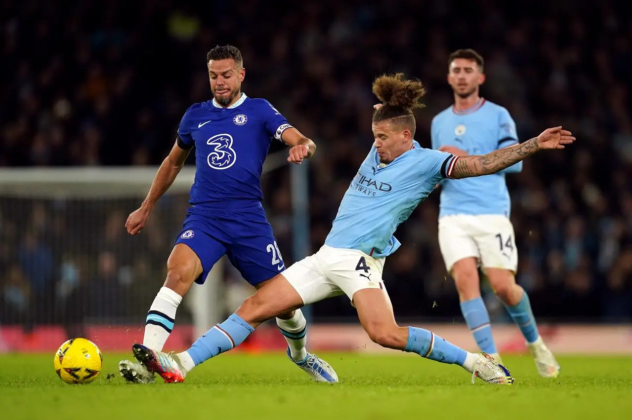 Phillips (right) in action against Chelsea on Sunday (Martin Rickett/PA).