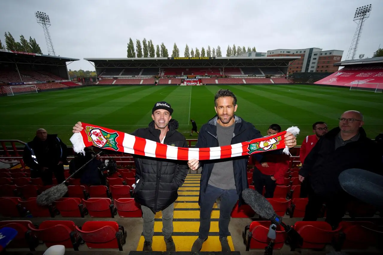 Hollywood actors Rob McElhenney and Ryan Reynolds are co-chairmen at the Racecourse Ground 
