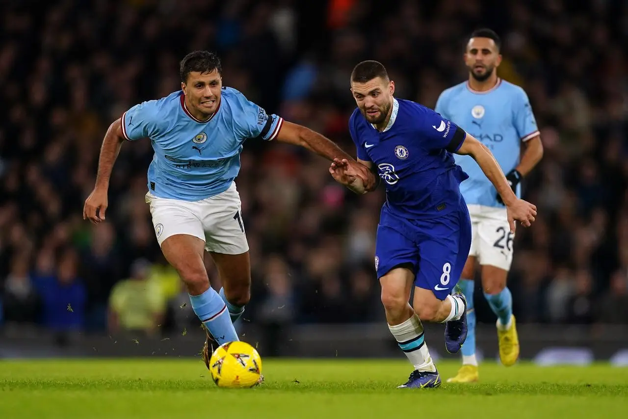 Guardiola has urged Phillips to “fight” with Rodri (left) for a place in the team (Martin Rickett/PA).