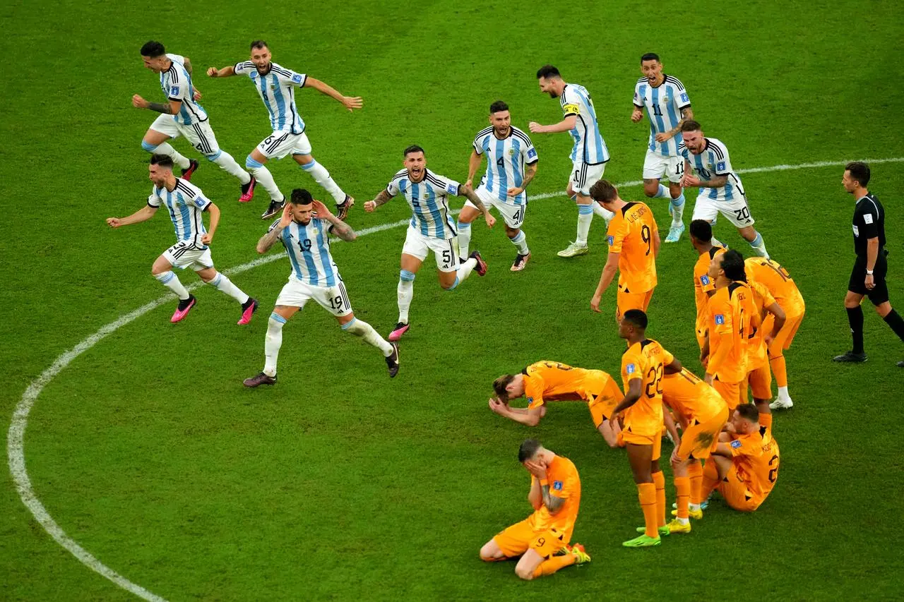 Argentina’s players provocatively taunt the despondent Dutch after dumping the Netherlands out of the World Cup on penalties 