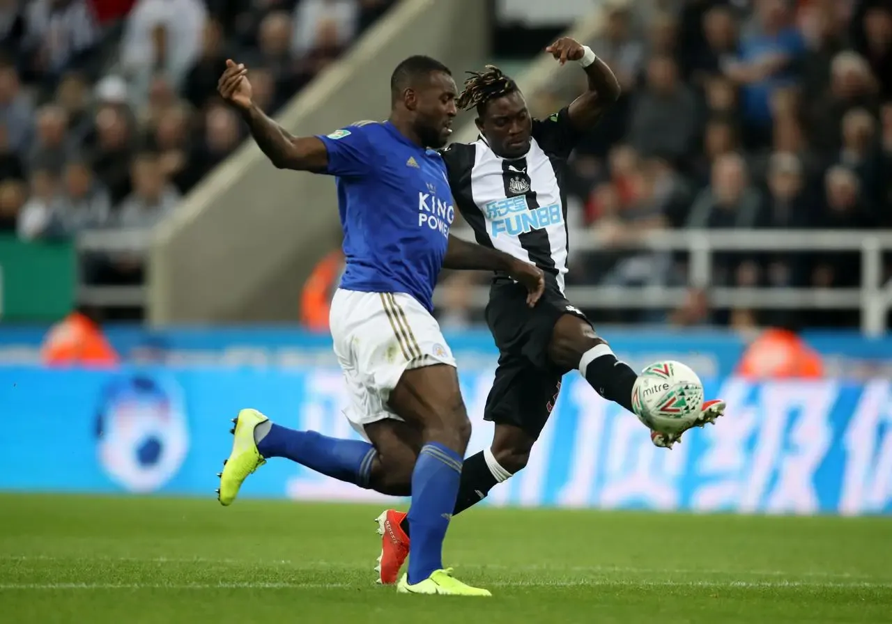 Atsu tussles with former Leicester captain Wes Morgan (Owen Humphreys/PA).