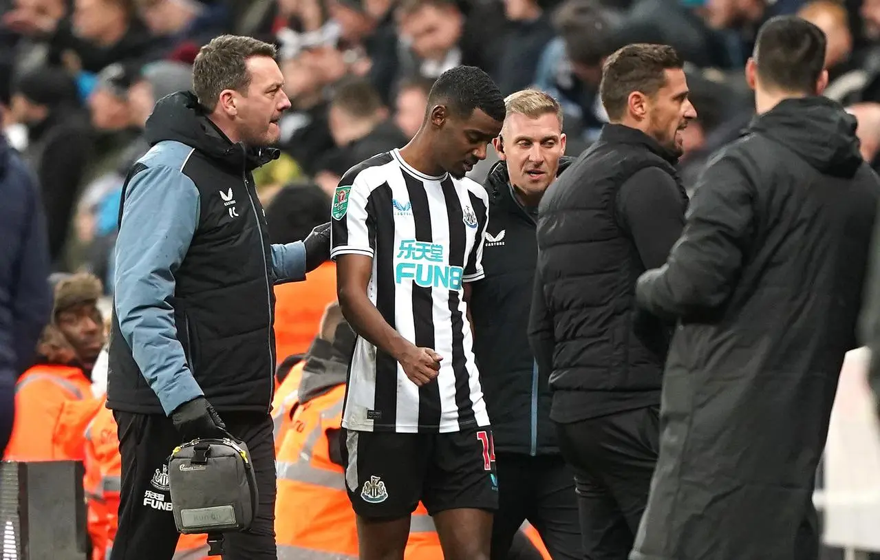 Newcastle striker Alexander Isak  leaves the pitch after a suffering blow to the head against Southampton on Tuesday evening