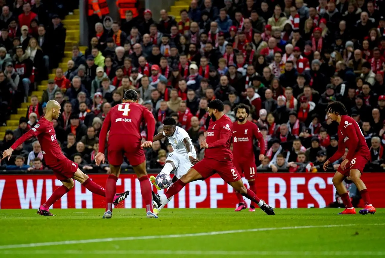 Vinicius Jr, centre, scores Real Madrid’s first goal