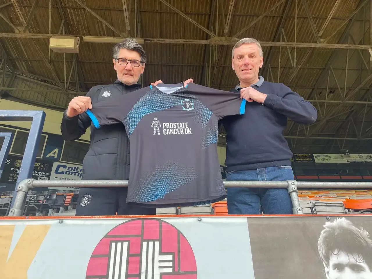 Mick Harford (left) and Luton's matchday hospitality host Les Turton (right) help promote Prostate FC