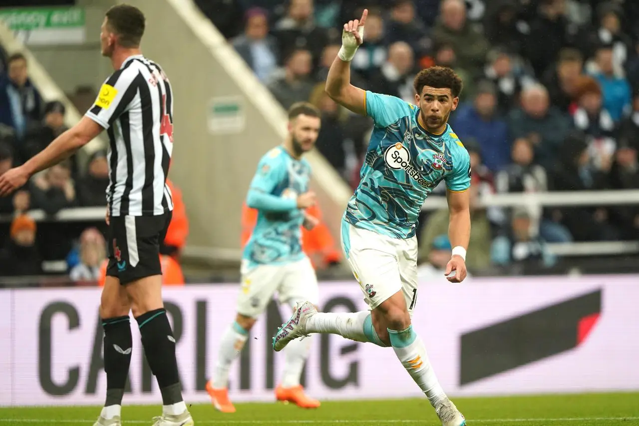 Southampton’s Che Adams (right) celebrates his goal at St James' Park