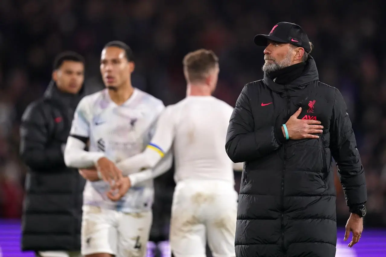 Liverpool manager Jurgen Klopp salutes the fans