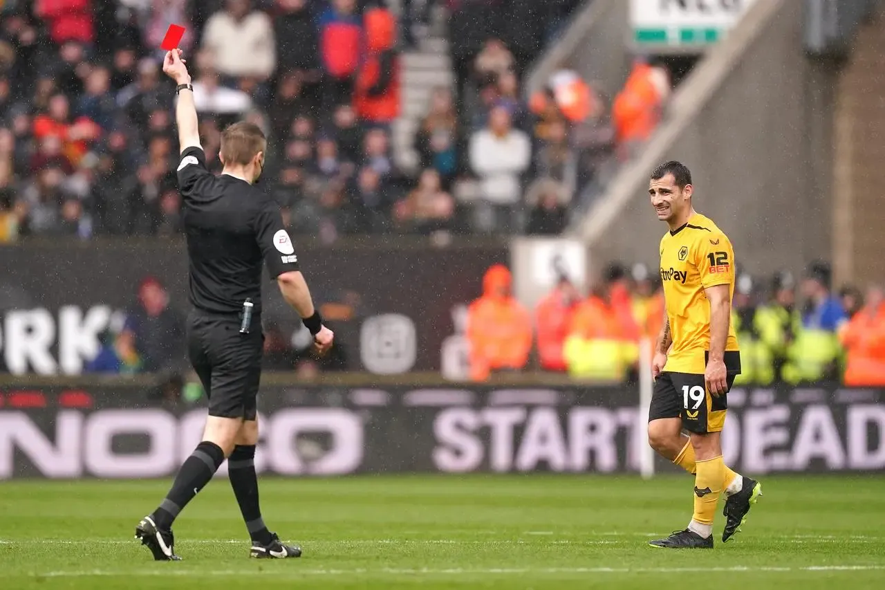 Jonny, right, is shown a red card by referee Michael Salisbury