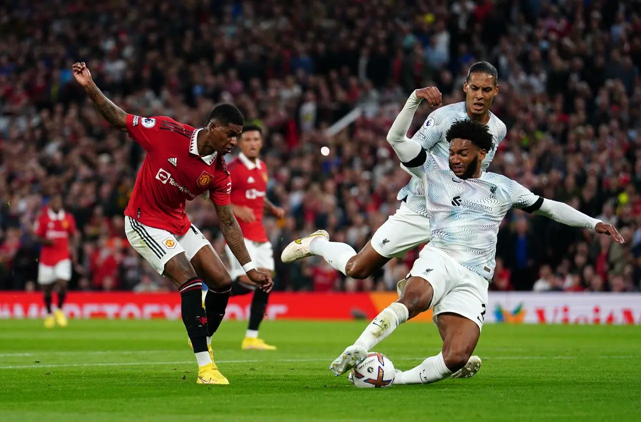 Marcus Rashford takes a shot against Liverpool (David Davies/PA)