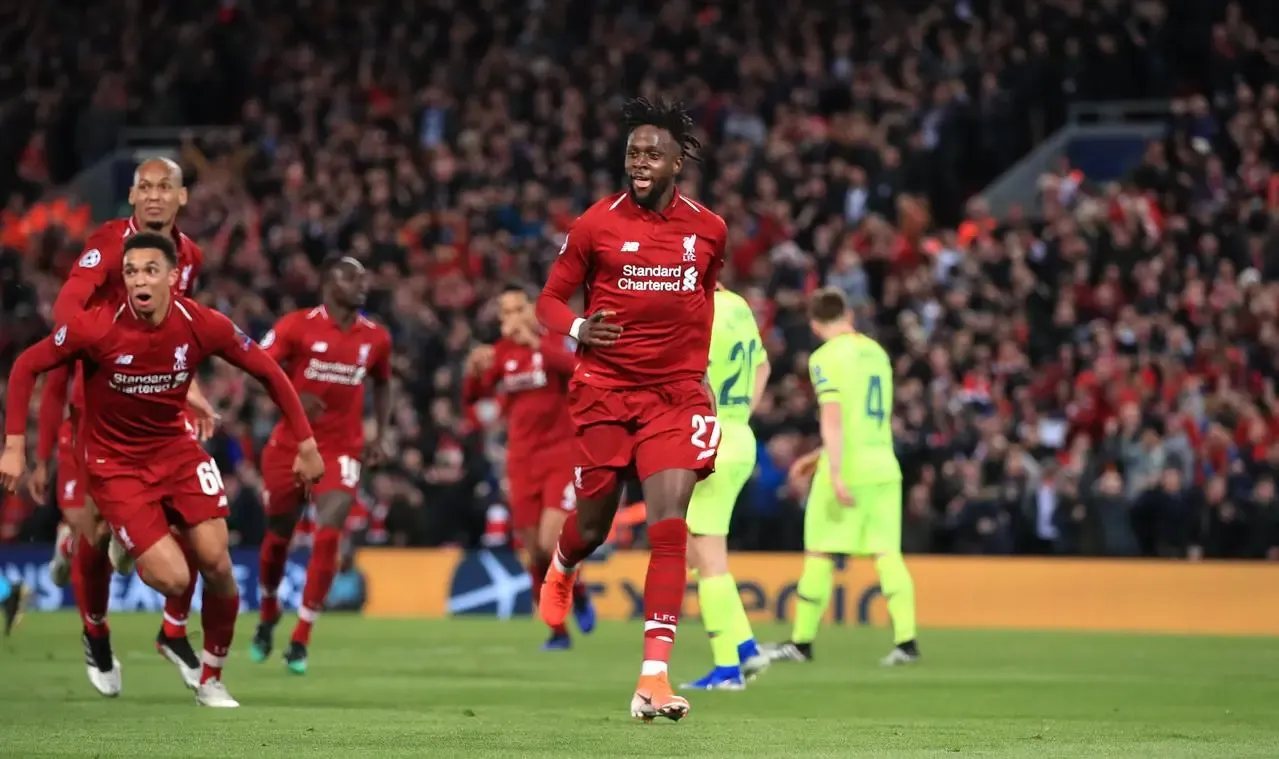 Divock Origi celebrates his winning goal against Barcelona in 2019 as corner taker Trent Alexander-Arnold reacts