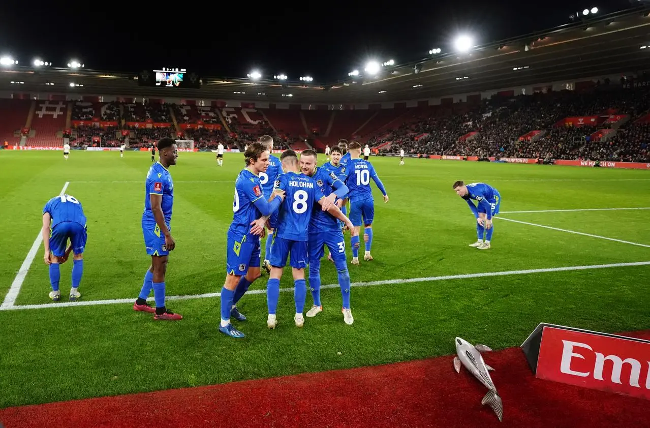 Grimsby's players celebrate their second goal 