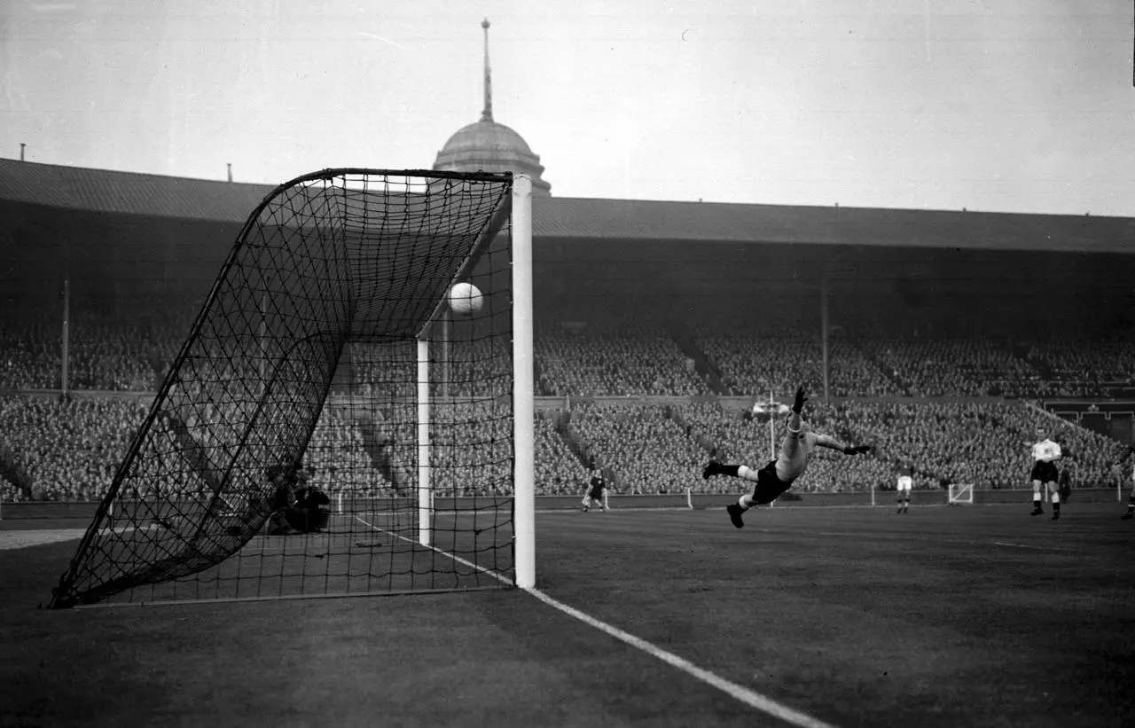 England keeper Gil Merrick is beaten by Hungary's Nandor Hidegkuti for the first time