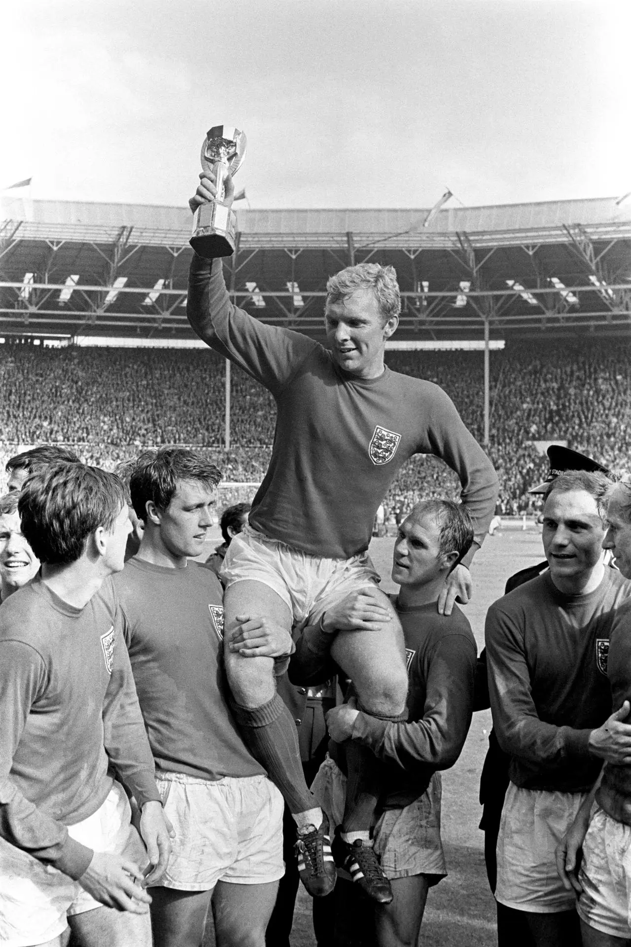 England captain Bobby Moore holds the 1966 World Cup aloft