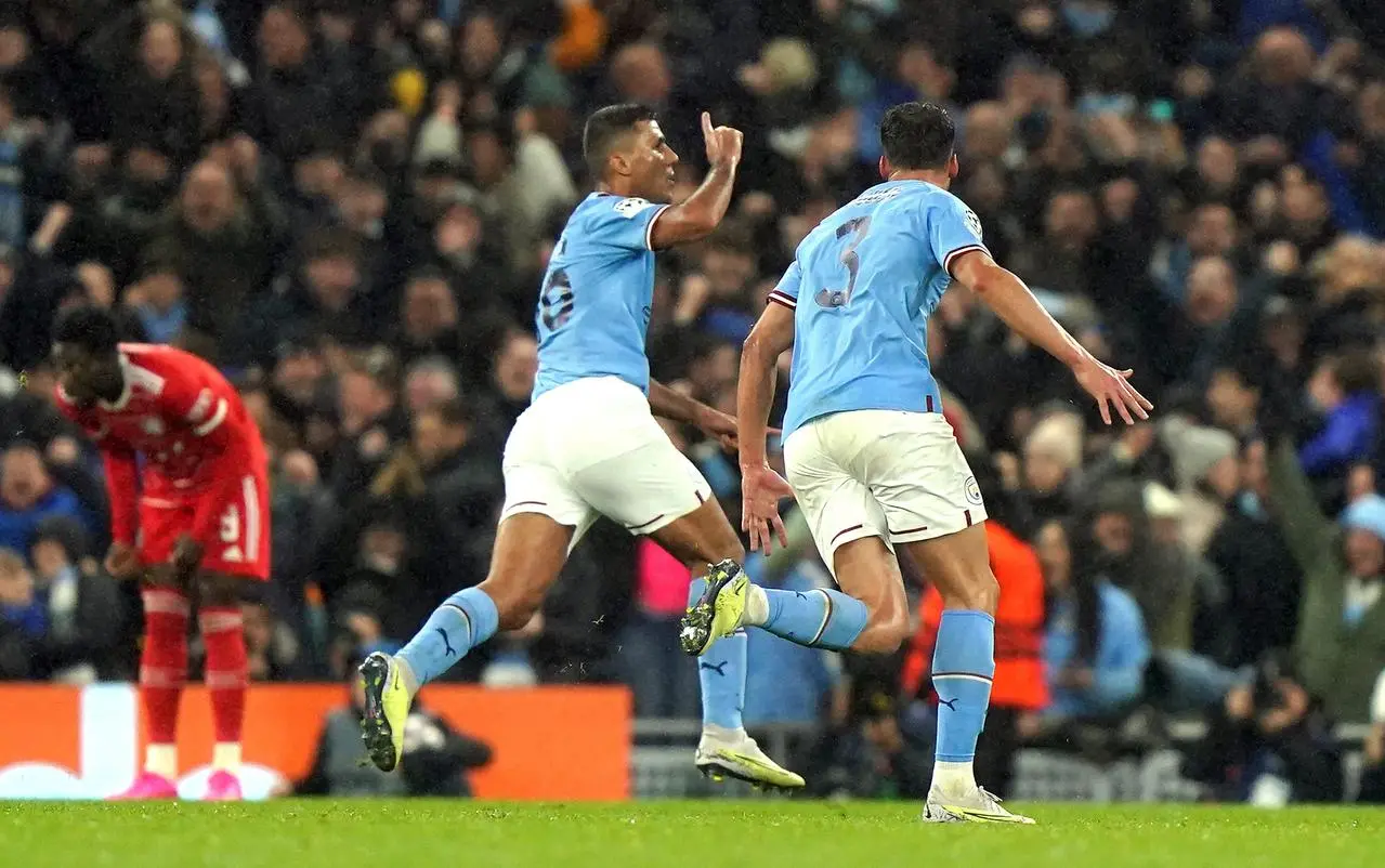 Rodri (left) celebrates scoring their side’s first goal of the game against Bayern.